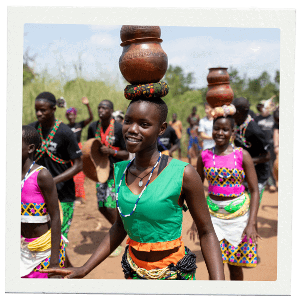 Young African girls with pottery on their heads